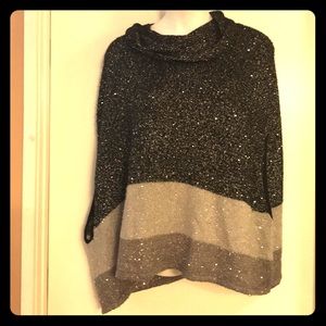 Chico’s Black, Silver and Dark Silver Poncho L/XL.